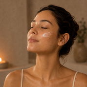Applying La Crème Satinée, Hendiya® organic anti-aging night cream, to the face
